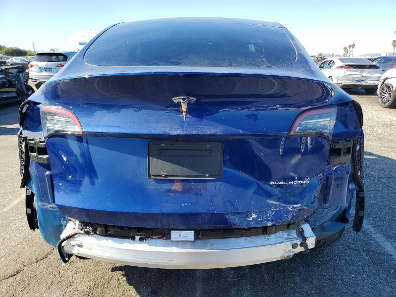 Photo 6 from auction – 2022 TESLA MODEL Y with VIN 7SAYGDEE2NF330146