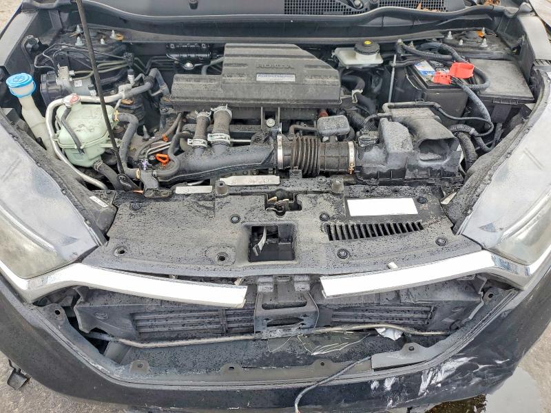 Photo 11 from auction – 2018 HONDA CR-V with VIN 7FARW1H53JE007754