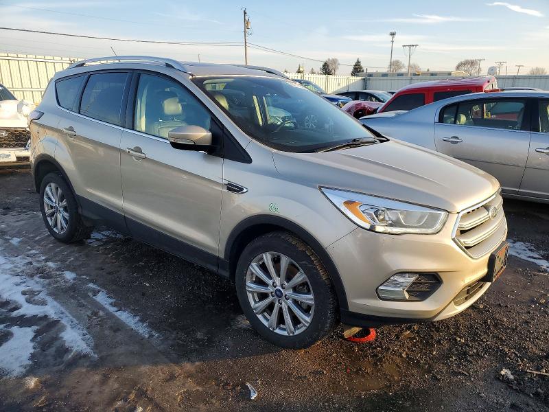 Photo 4 from auction – 2017 FORD ESCAPE TIT with VIN 1FMCU9J91HUD60736