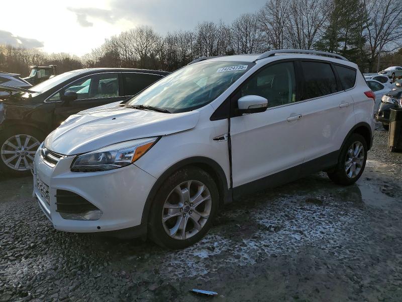 FORD ESCAPE TIT 2014 with VIN 1FMCU9J93EUD12764 - Photo from auction