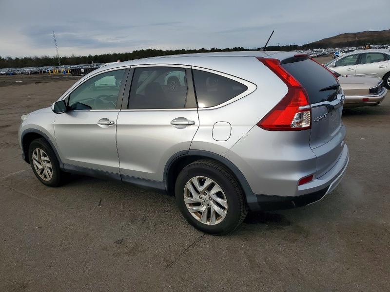Photo 2 from auction – 2015 HONDA CR-V with VIN 2HKRM4H54FH668012