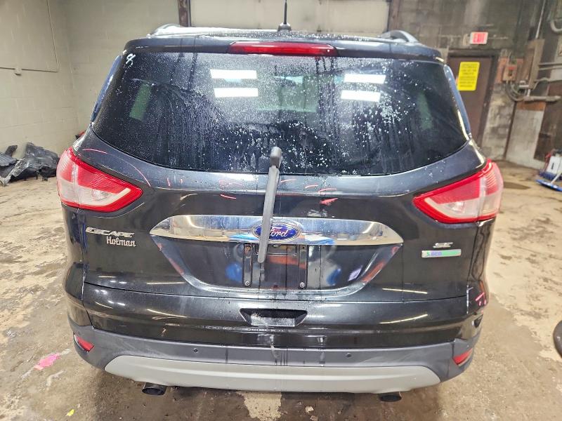Photo 6 from auction – 2014 FORD ESCAPE SE with VIN 1FMCU0G93EUE05657
