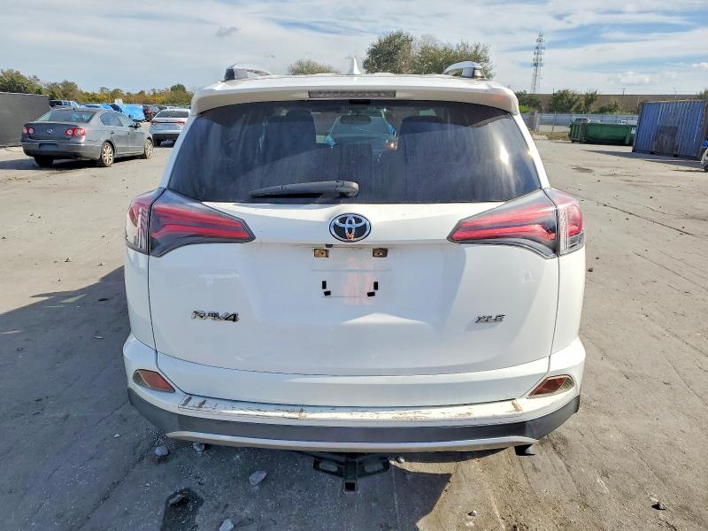 Photo 6 from auction – 2016 TOYOTA RAV4 XLE with VIN JTMWFREV2GJ089964