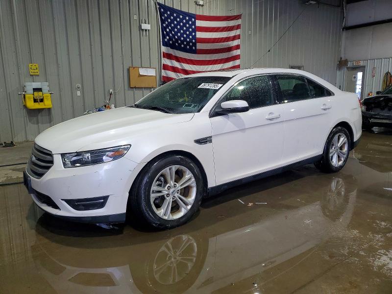 FORD TAURUS SEL 2016 with VIN 1FAHP2E83GG138616 - Photo from auction