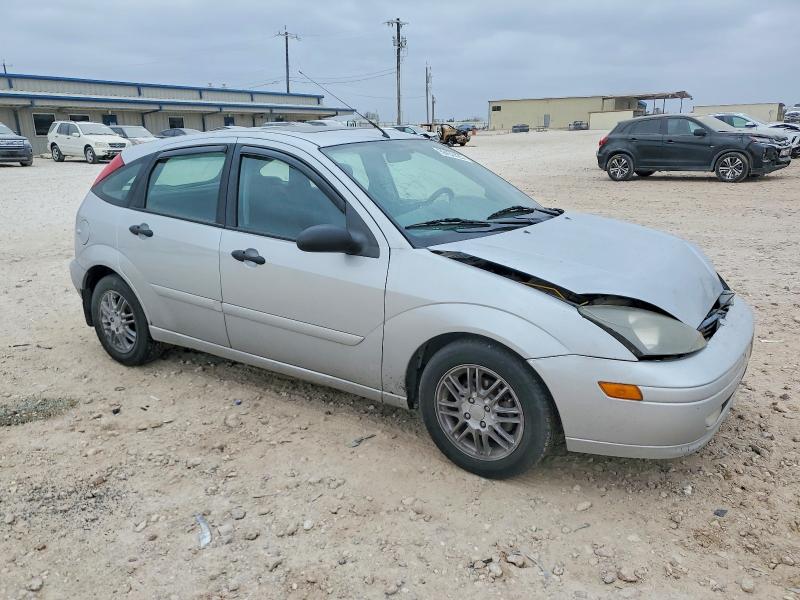 Photo 4 from auction – 2004 FORD FOCUS with VIN 3FAFP37Z54R122117