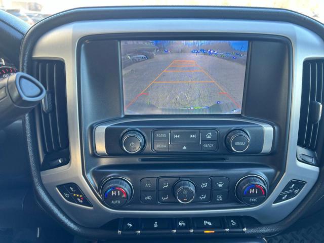 Photo 11 from auction – 2014 GMC SIERRA K15 with VIN 3GTU2VECXEG238341