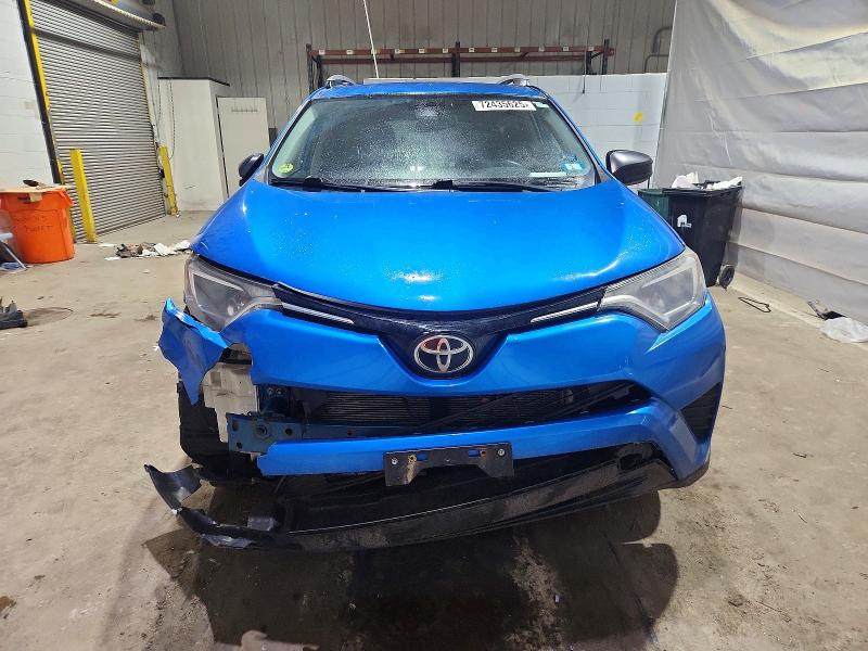 Photo 5 from auction – 2017 TOYOTA RAV4 LE with VIN 2T3BFREV7HW565014
