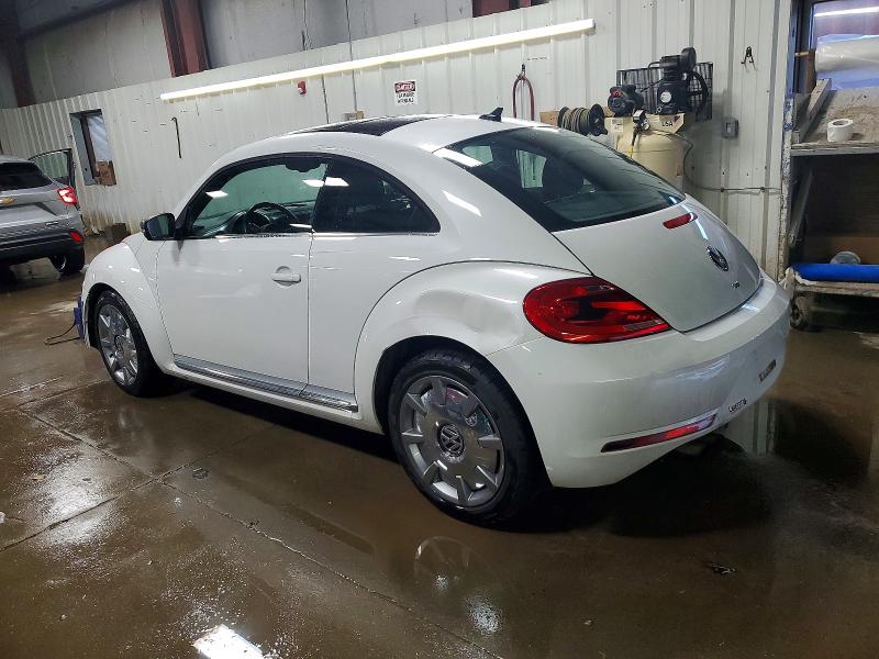 Photo 2 from auction – 2014 VOLKSWAGEN BEETLE with VIN 3VWJL7AT1EM653693