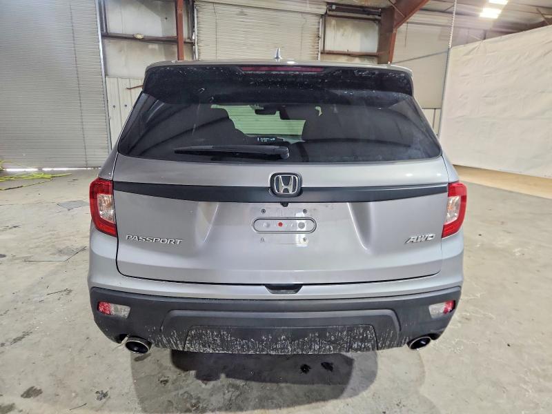 Photo 6 from auction – 2021 HONDA PASSPORT E with VIN 5FNYF8H51MB035704