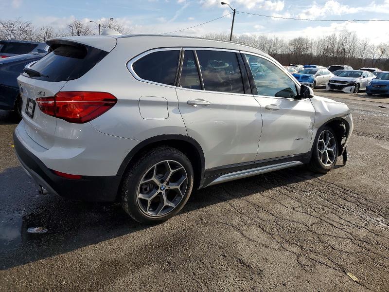 Photo 3 from auction – 2017 BMW X1 XDRIVE2 with VIN WBXHT3C34H5F80486