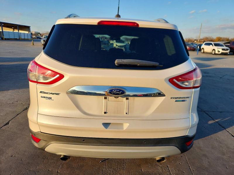 Снимка 6 от търг – 2015 FORD ESCAPE TIT с VIN 1FMCU9J91FUB81870
