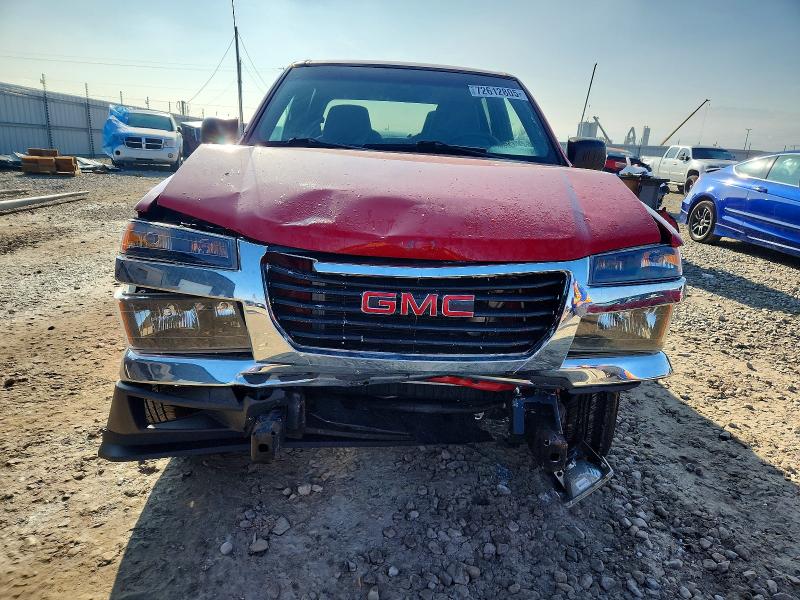 Photo 5 from auction – 2004 GMC CANYON with VIN 1GTCS136348220110