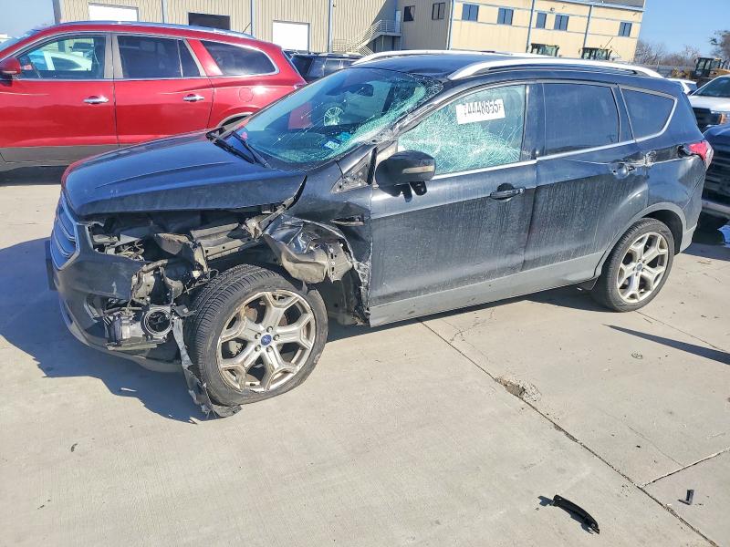 FORD ESCAPE 2017 with VIN 1FMCU0JD6HUC50801 - Photo from auction