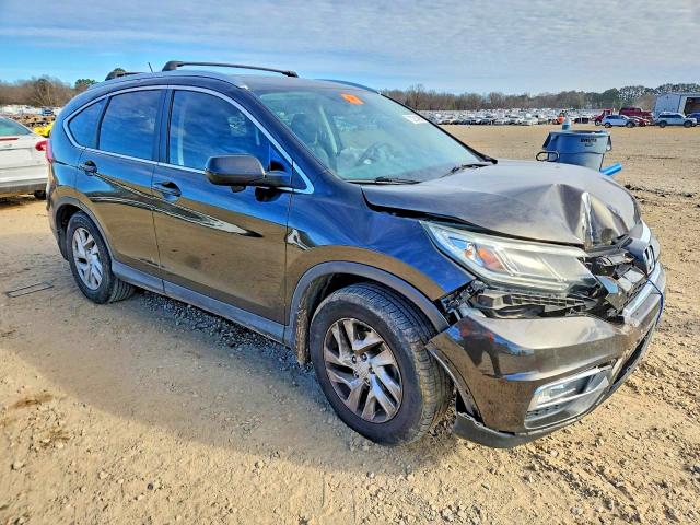 Photo 4 from auction – 2015 HONDA CR-V EXL with VIN 2HKRM3H79FH515430