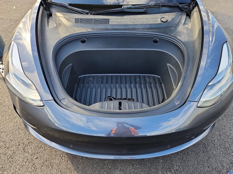 Photo 11 from auction – 2022 TESLA MODEL 3 with VIN 5YJ3E1EB9NF243622