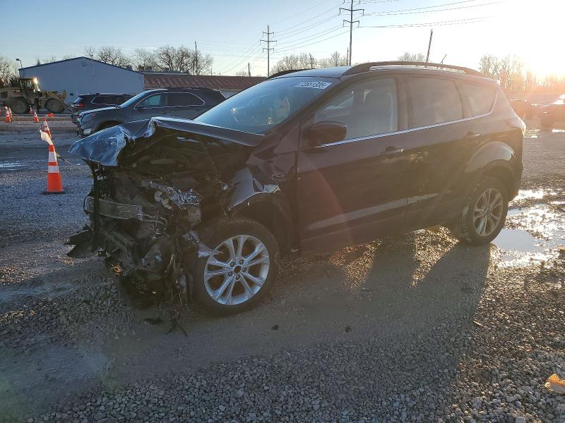 FORD ESCAPE 2017 with VIN 1FMCU0GD5HUE67778 - Photo from auction