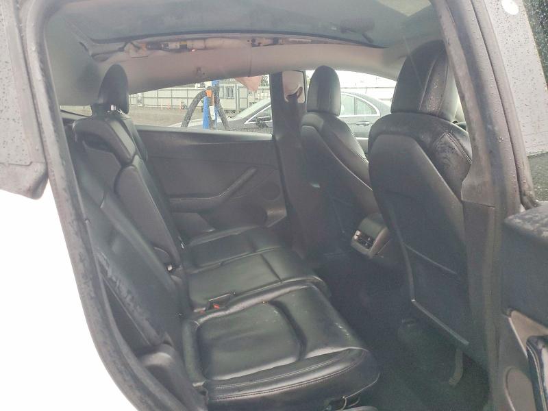 Photo 11 from auction – 2021 TESLA MODEL Y with VIN 5YJYGAEE6MF185722
