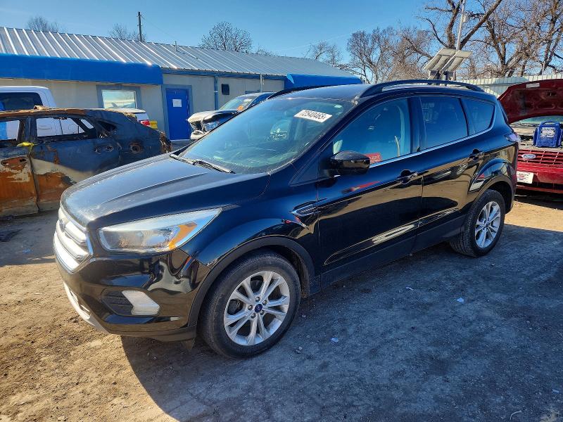 FORD ESCAPE 2018 with VIN 1FMCU0GD8JUA52685 - Photo from auction
