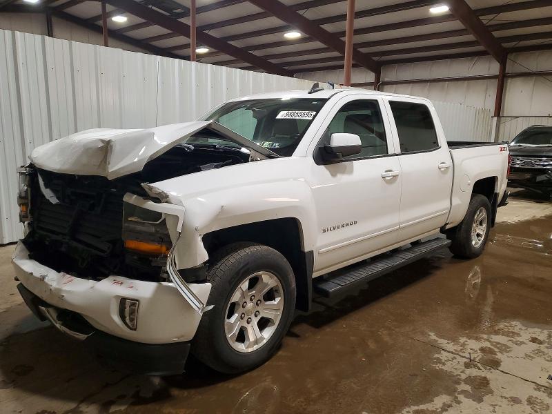 CHEVROLET SILVERADO 2018 with VIN 3GCUKREC3JG354112 - Photo from auction