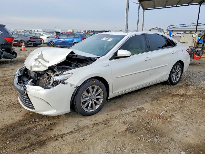 TOYOTA CAMRY HYBR 2015 with VIN 4T1BD1FK2FU153701 - Photo from auction