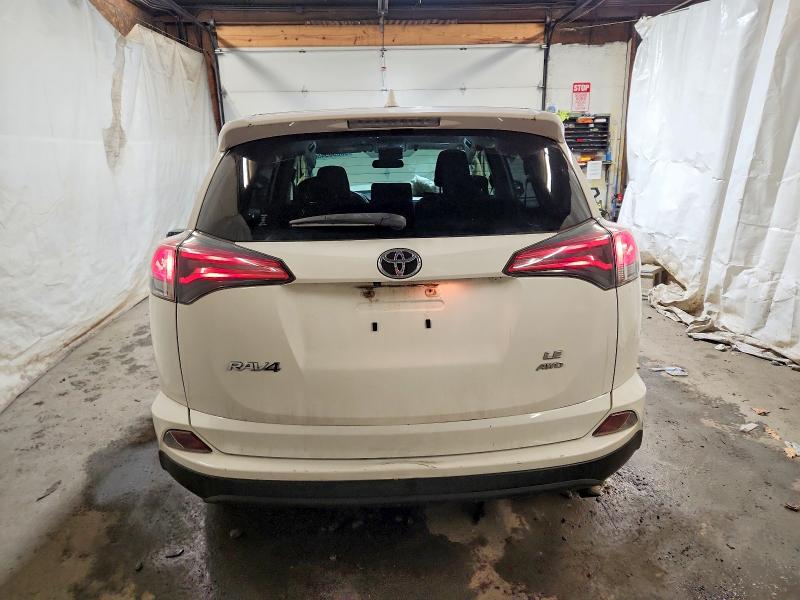 Photo 6 from auction – 2018 TOYOTA RAV4 LE with VIN JTMBFREV0JJ205393