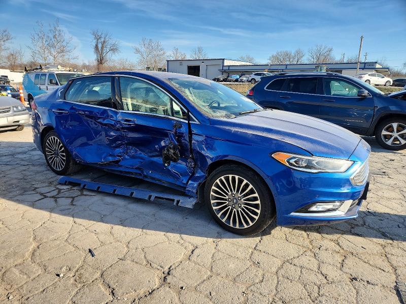 Photo 4 from auction – 2017 FORD FUSION TIT with VIN 3FA6P0K95HR326122
