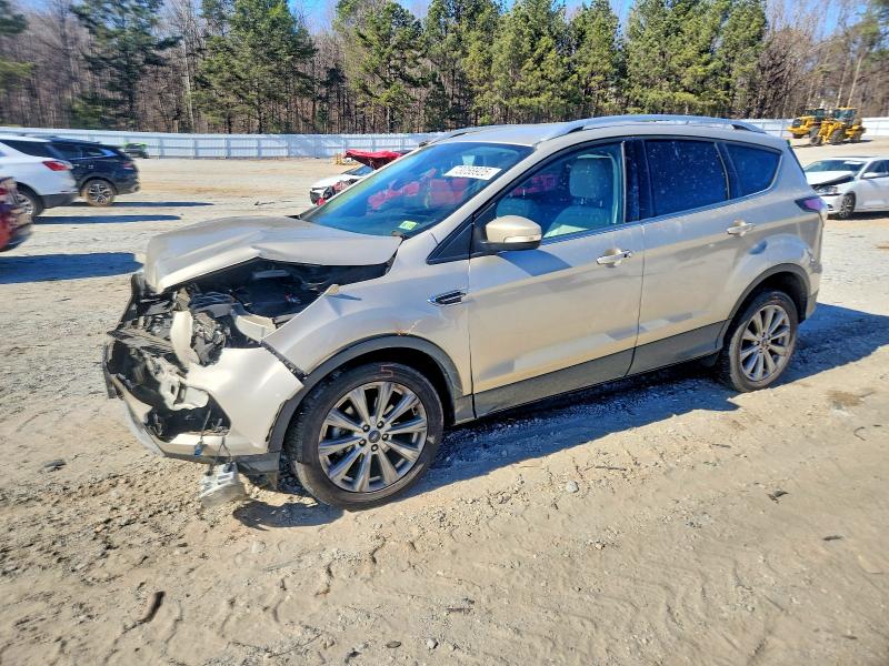FORD ESCAPE TIT 2017 con VIN 1FMCU0JD5HUB65951 - Foto de la subasta