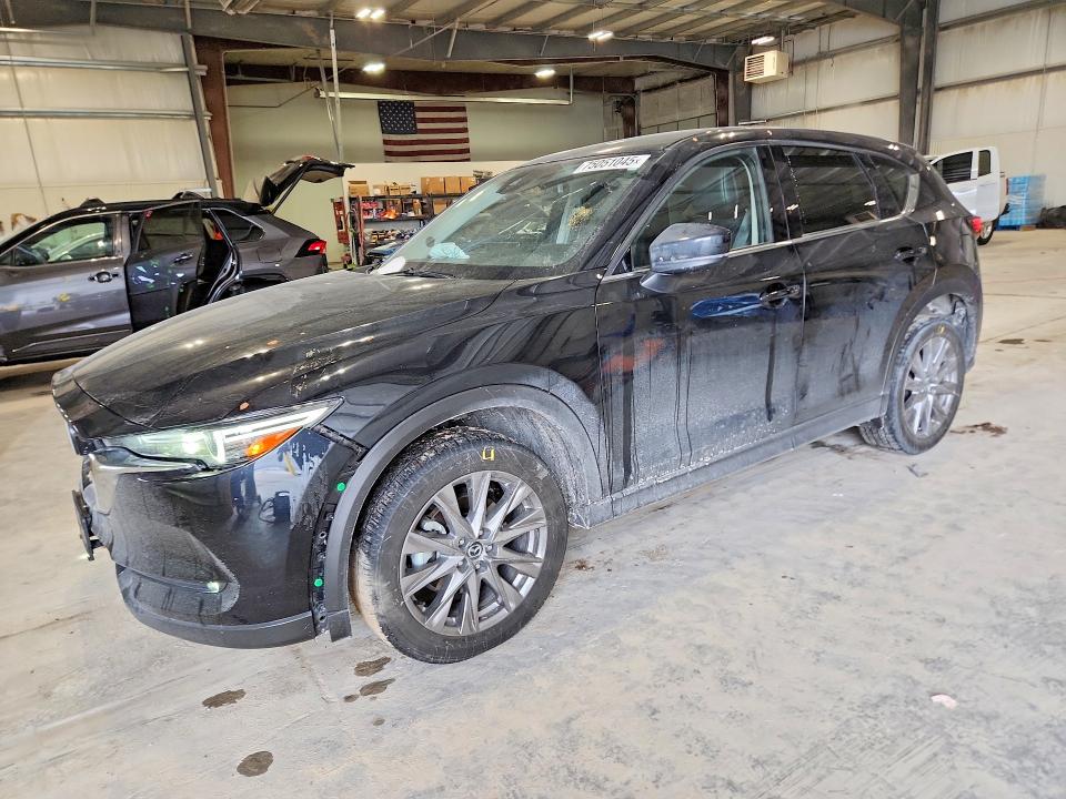 MAZDA CX-5 2021 with VIN JM3KFBAY6M0472448 - Photo from auction