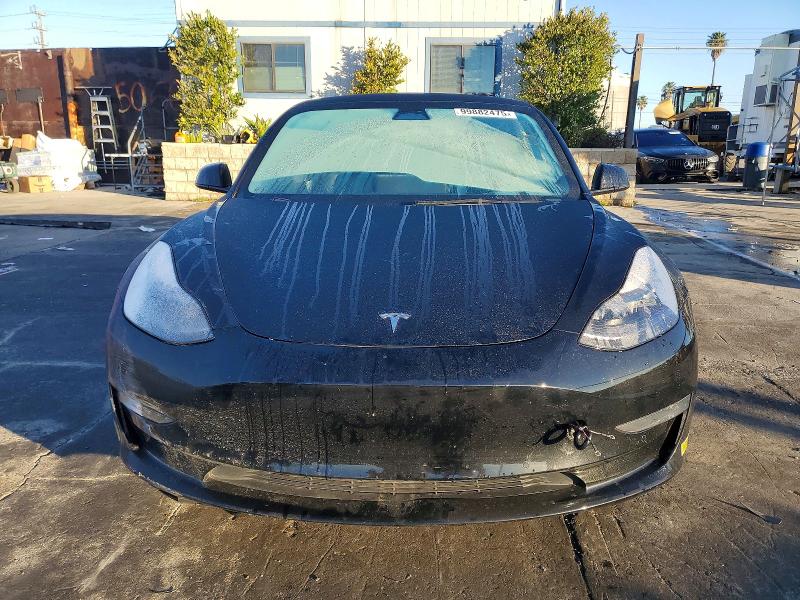 Photo 5 from auction – 2022 TESLA MODEL 3 with VIN 5YJ3E1EB3NF180999
