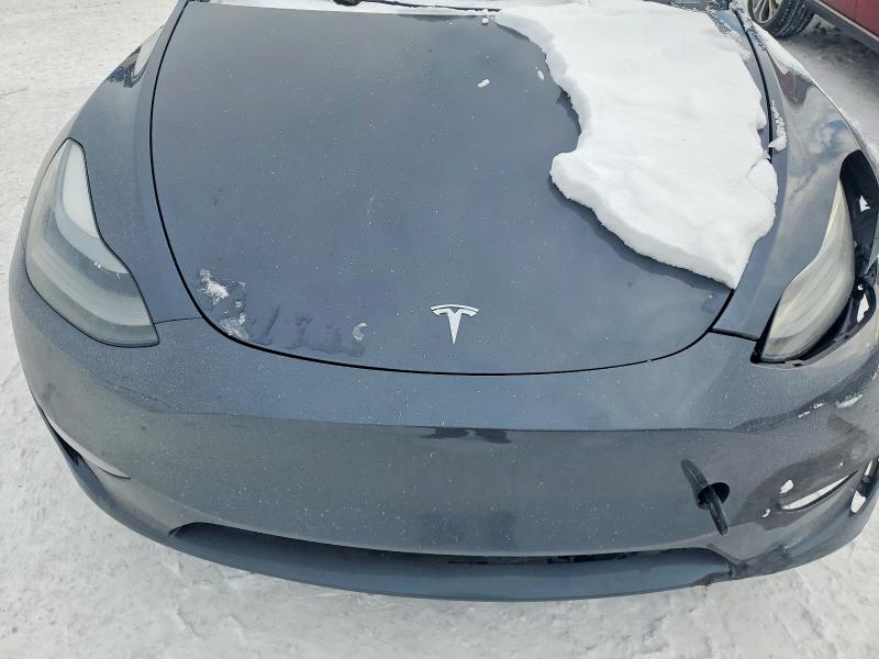 Photo 11 from auction – 2023 TESLA MODEL Y with VIN 7SAYGDEE9PF859614