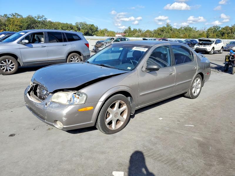 NISSAN MAXIMA GLE 2000 with VIN JN1CA31DXYT529613 - Photo from auction