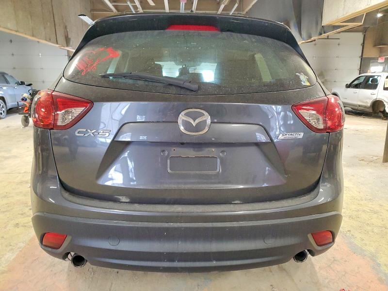 Photo 6 from auction – 2014 MAZDA CX-5 SPORT with VIN JM3KE2BE1E0358592