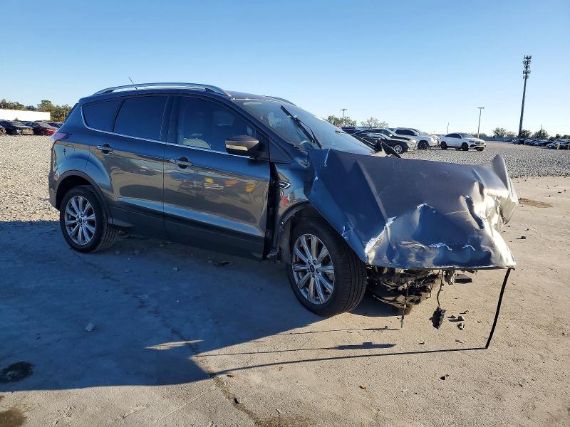 Photo 4 from auction – 2017 FORD ESCAPE TIT with VIN 1FMCU9JD8HUD21422