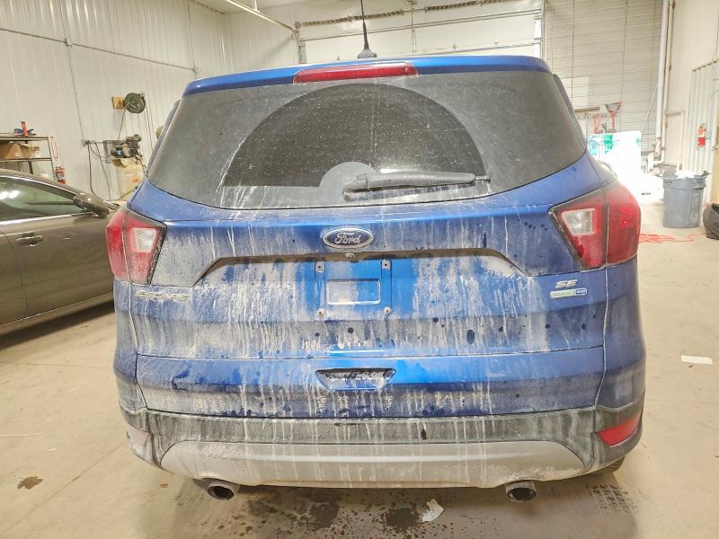 Photo 6 from auction – 2019 FORD ESCAPE with VIN 1FMCU9GD2KUA05951