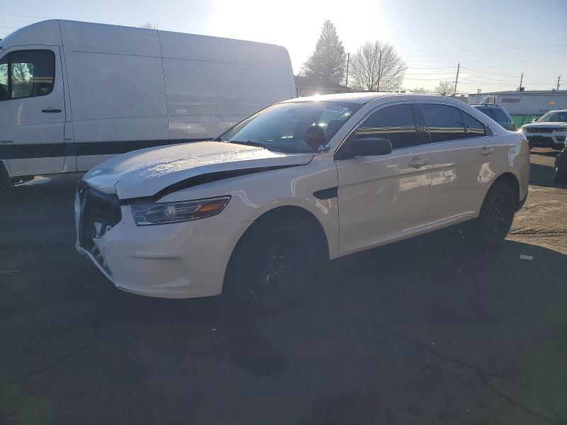 FORD TAURUS POL 2015 with VIN 1FAHP2MK5FG159897 - Photo from auction