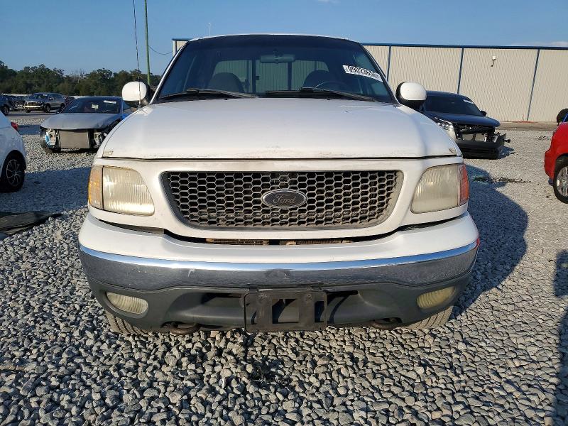 Photo 5 from auction – 2000 FORD F150 with VIN 1FTRX18LXYNB06221