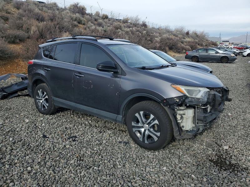 Photo 4 from auction – 2018 TOYOTA RAV4 LE with VIN JTMBFREV4JJ208961