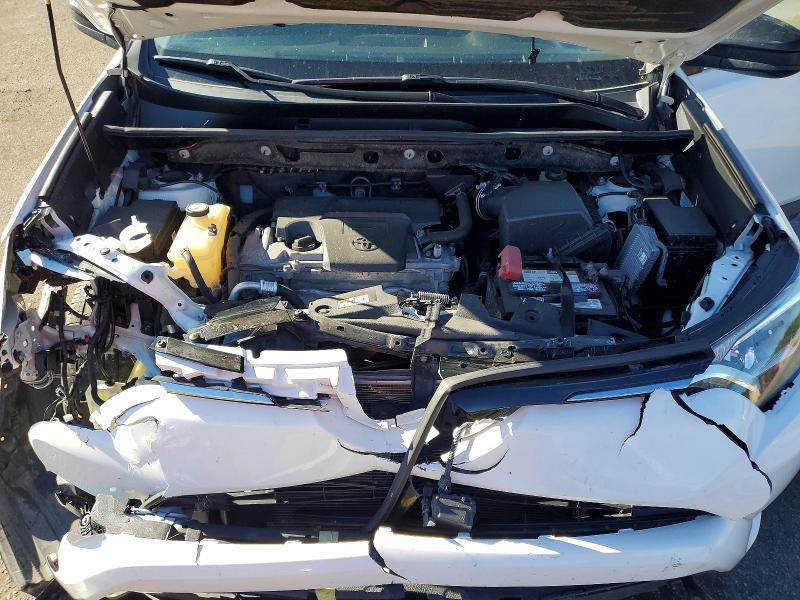 Photo 12 from auction – 2018 TOYOTA RAV4 LE with VIN JTMZFREV0JJ201570