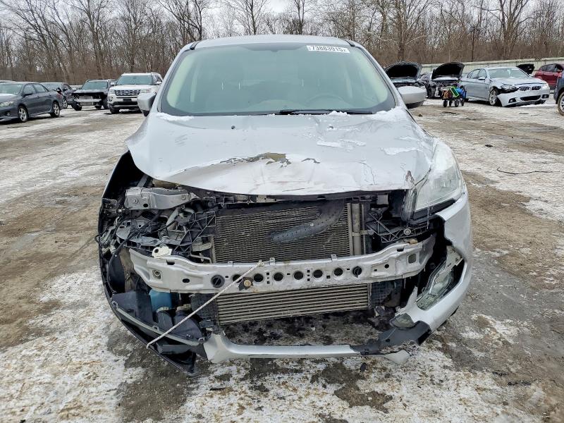Photo 5 from auction – 2016 FORD ESCAPE with VIN 1FMCU9GX1GUB68611