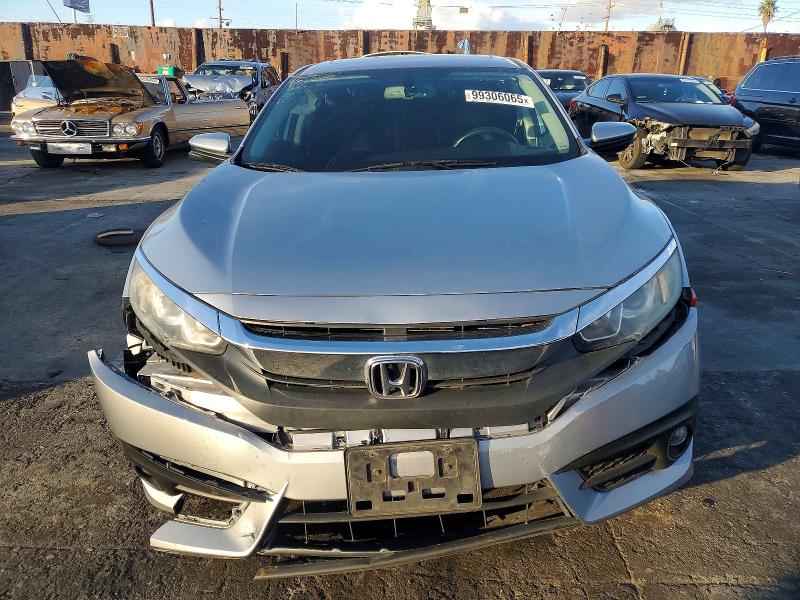 Photo 5 from auction – 2016 HONDA CIVIC with VIN 2HGFC1F74GH653885