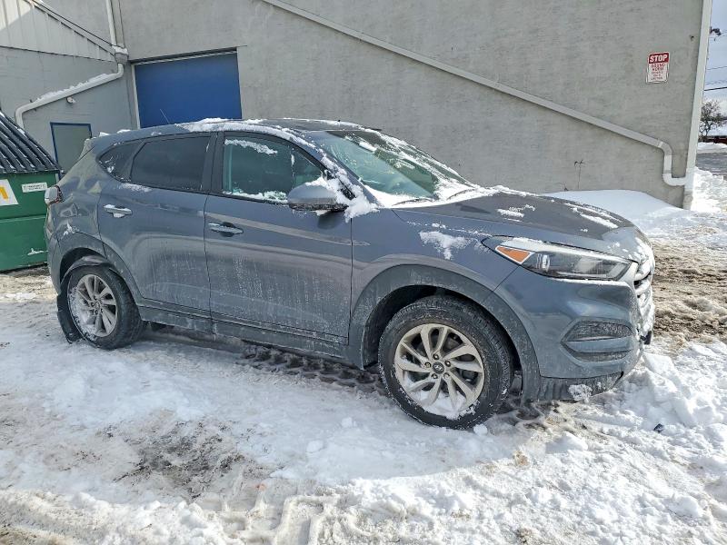 Photo 4 from auction – 2018 HYUNDAI TUCSON SE with VIN KM8J2CA48JU676445