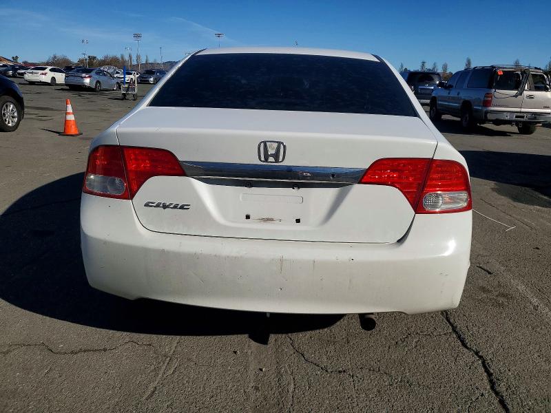 Photo 6 from auction – 2011 HONDA CIVIC LX with VIN 19XFA1F50BE047622