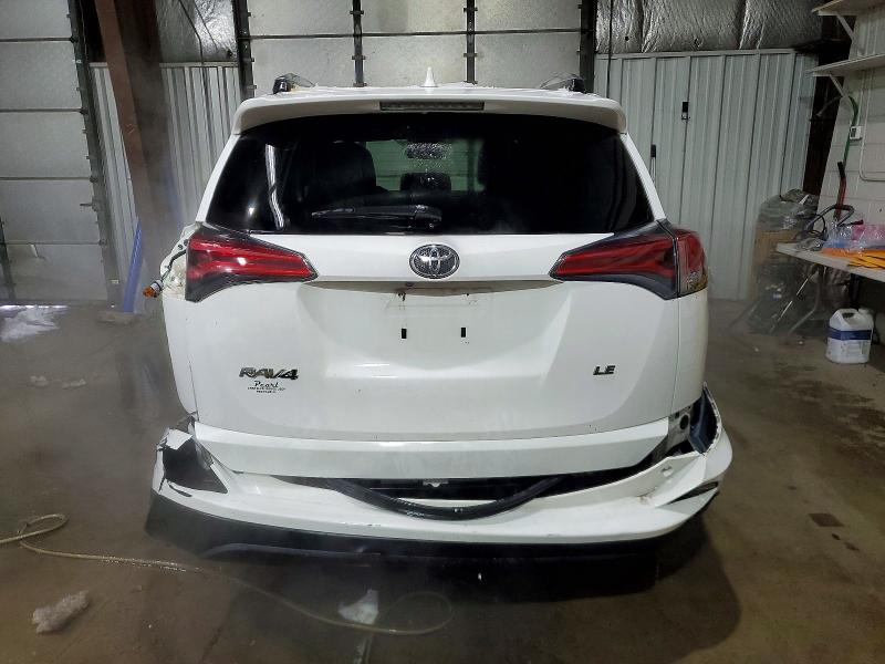 Photo 6 from auction – 2017 TOYOTA RAV4 LE with VIN JTMZFREV7HJ107972
