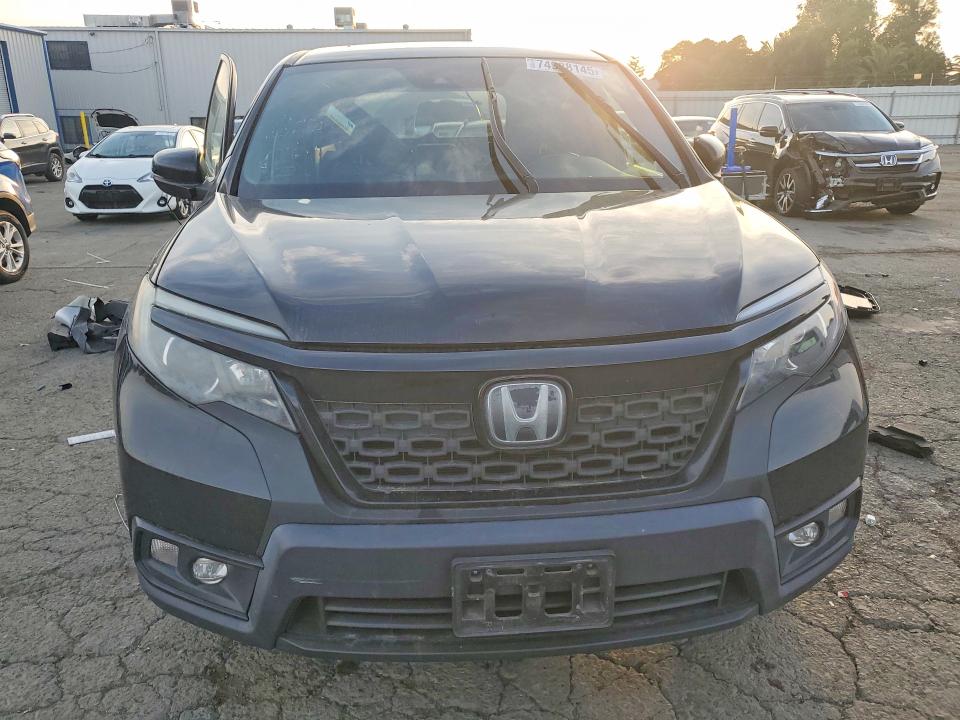 Photo 5 from auction – 2019 HONDA PASSPORT with VIN 5FNYF7H56KB010501