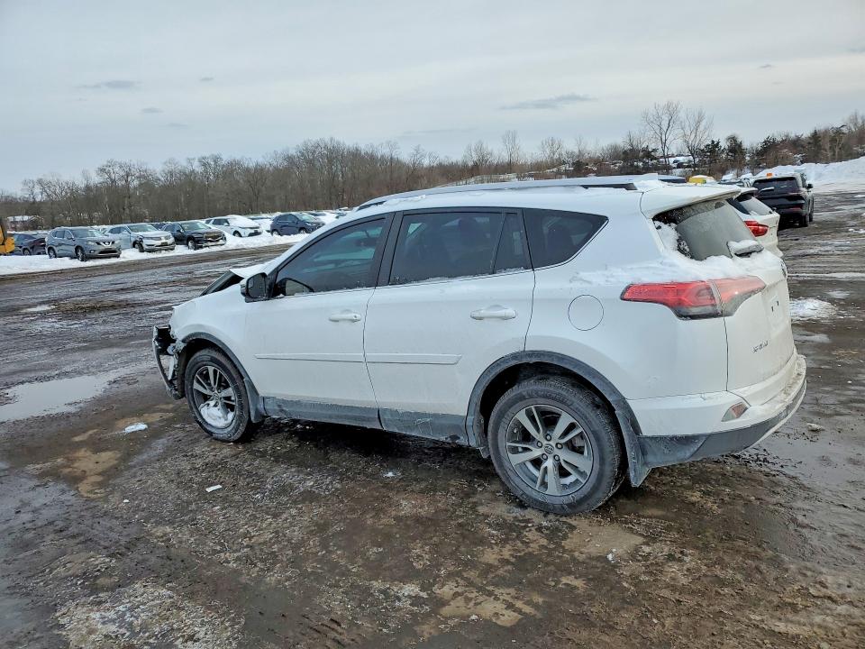 Photo 2 from auction – 2016 TOYOTA RAV4 XLE with VIN 2T3RFREV3GW477753