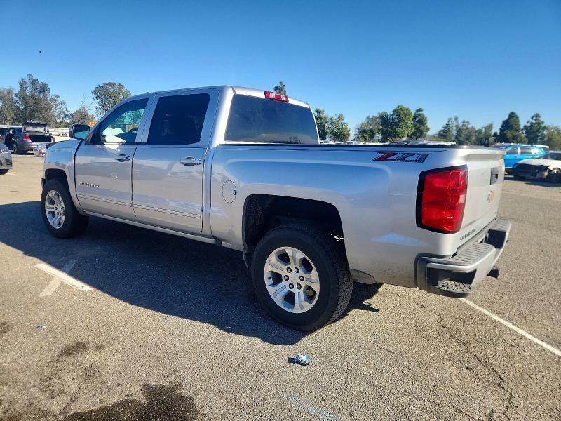 Photo 2 from auction – 2018 CHEVROLET SILVERADO with VIN 3GCUKREC0JG415710
