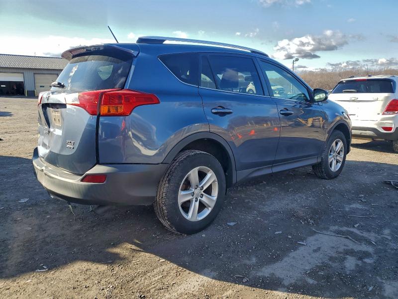 Photo 3 from auction – 2014 TOYOTA RAV4 XLE with VIN JTMRFREV1ED090550