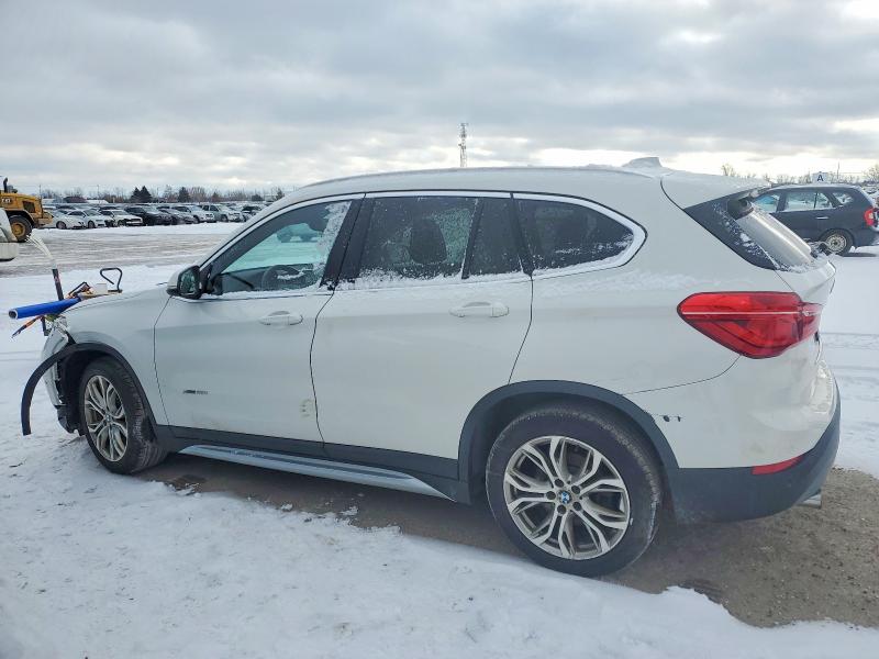 Photo 2 from auction – 2018 BMW X1 XDRIVE2 with VIN WBXHT3C32J5L25628