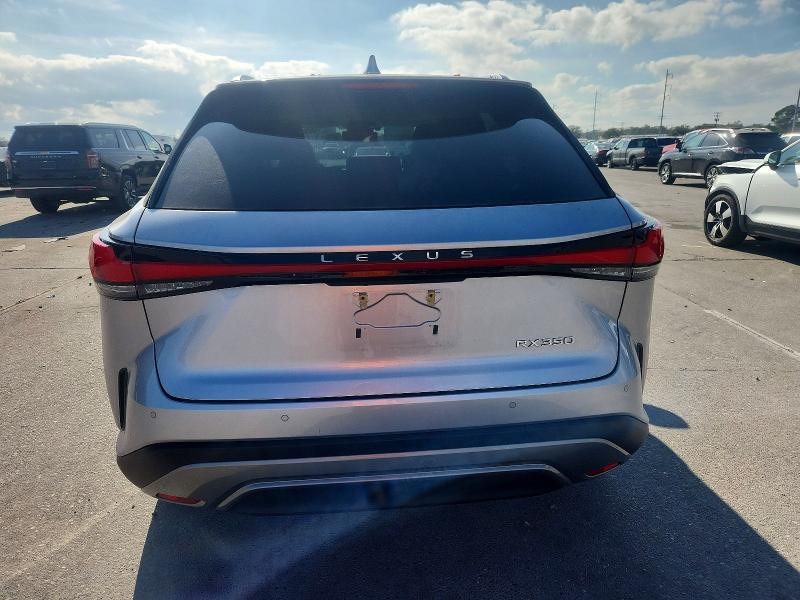 Photo 6 from auction – 2023 LEXUS RX with VIN JTJCHMAA0P2005912