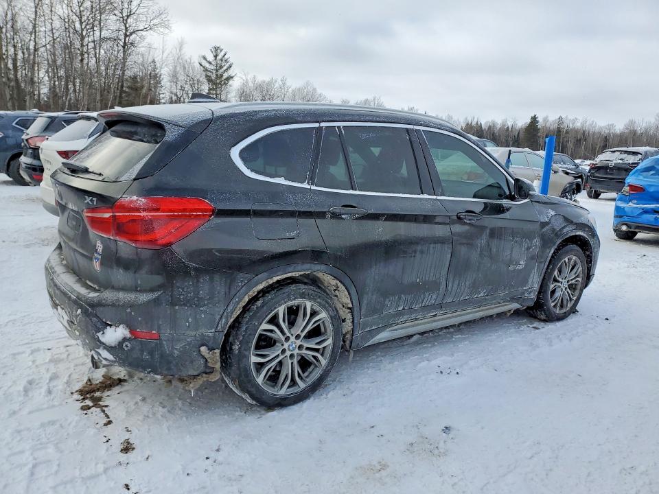 Photo 3 from auction – 2017 BMW X1 with VIN WBXHT3C32H5F84665